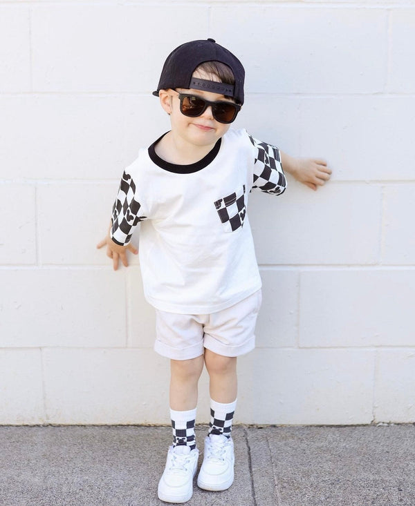 Checkerboard Magic - The Baby Penguin